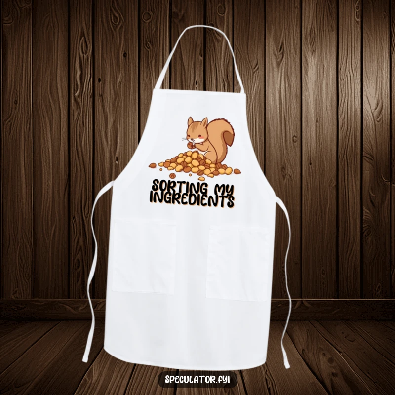 Funny apron graphic showing a squirrel expertly sorting nuts into tidy piles, for a fun kitchen experience.