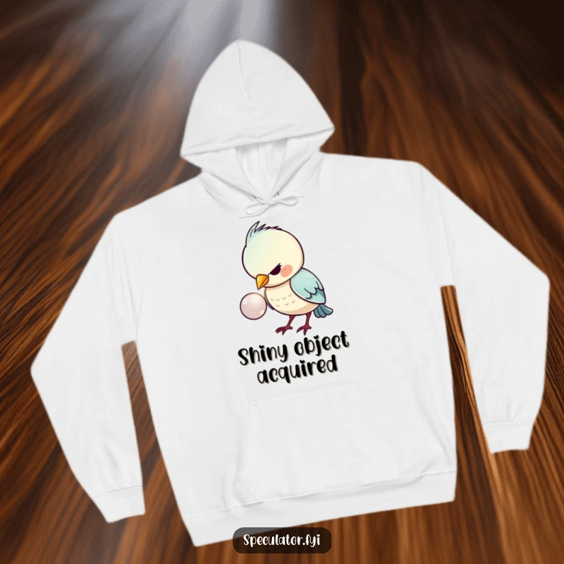 Funny, cozy hoodie depicting a kawaii bird with extreme focus on a shiny button, ideal for gifting warmth and smiles.