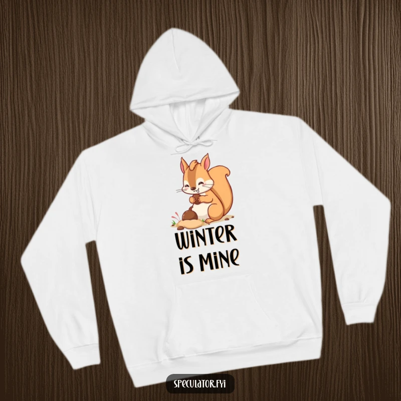 Funny kawaii squirrel character with a mischievous grin burying a nut under a pile of leaves on a hoodie.
