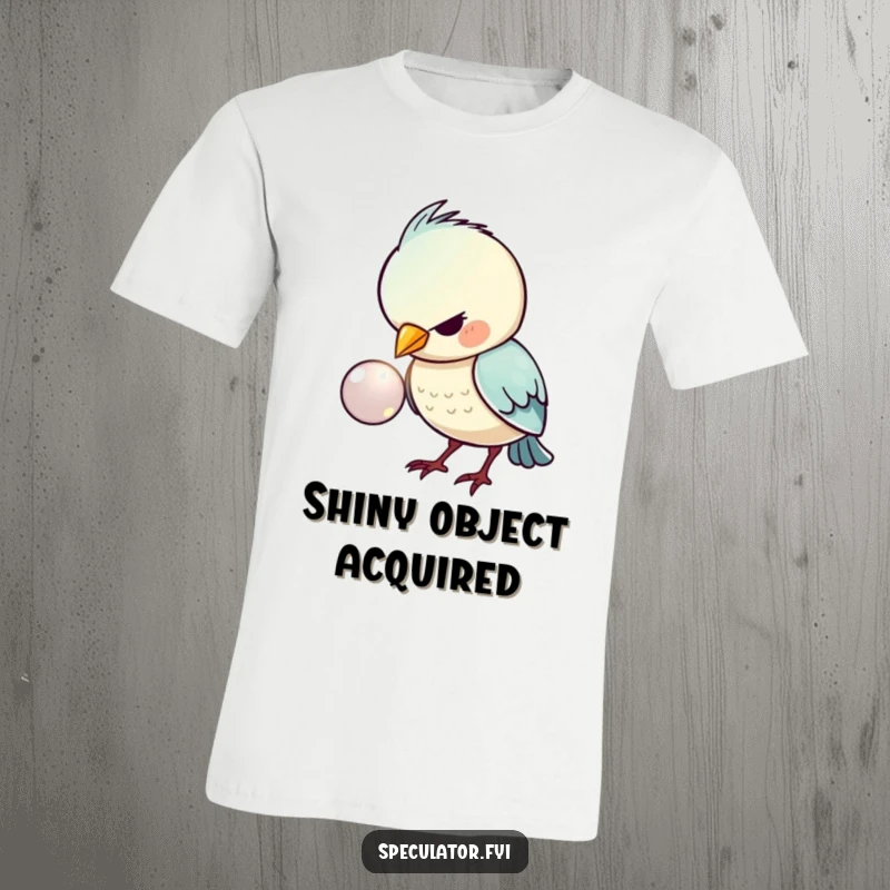 Funny t-shirt with a kawaii bird intensely staring at a shiny button, embodying focused curiosity and adding a touch of humor.